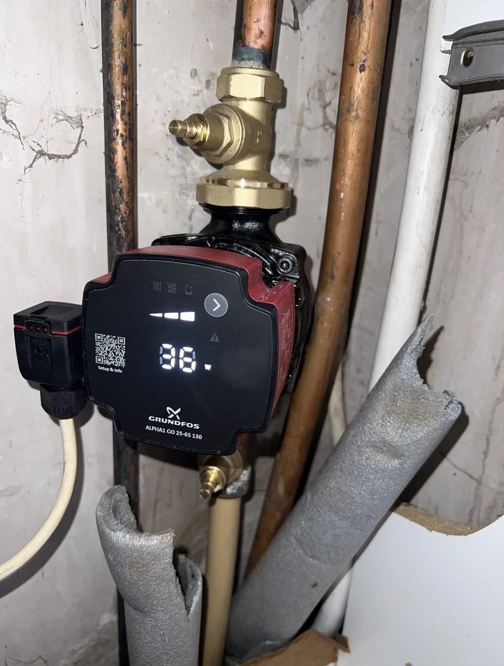 Circulator pump and copper piping serviced by Brampton Plumber Express